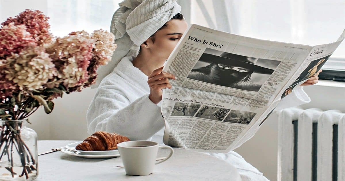 lady reading paper