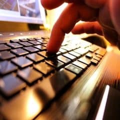 farmer accessing online controls